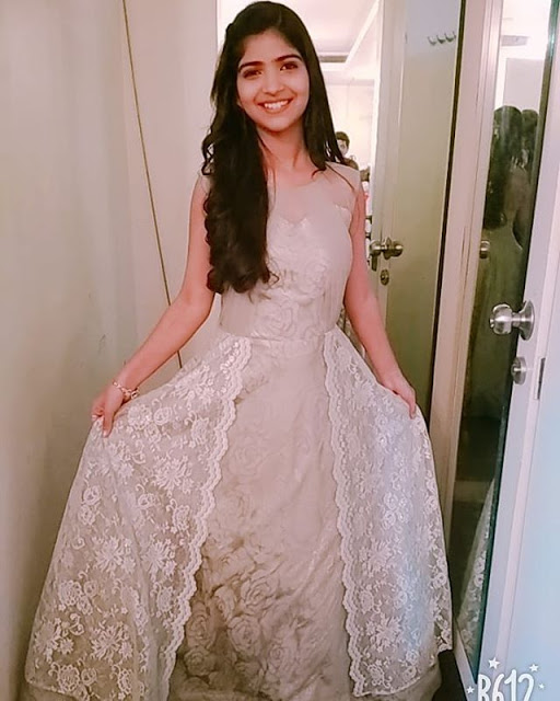 Prateeksha in a white gown image