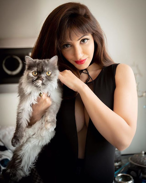 Reyhna Malhotra with her pet cat