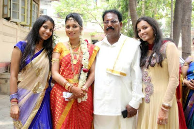 Srinidhi with her family