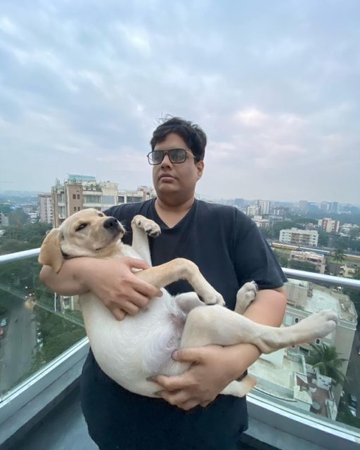 Tanmay Bhat with his dog in his terrace