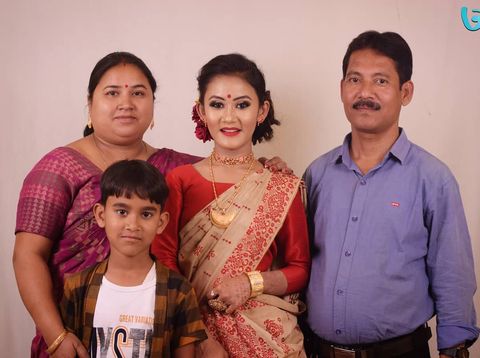 Manashi Sahariah with her father, mother, and brother - image